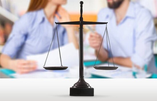 Divorce Lawyer - Married Couple Arguing The Details of Divorce Case